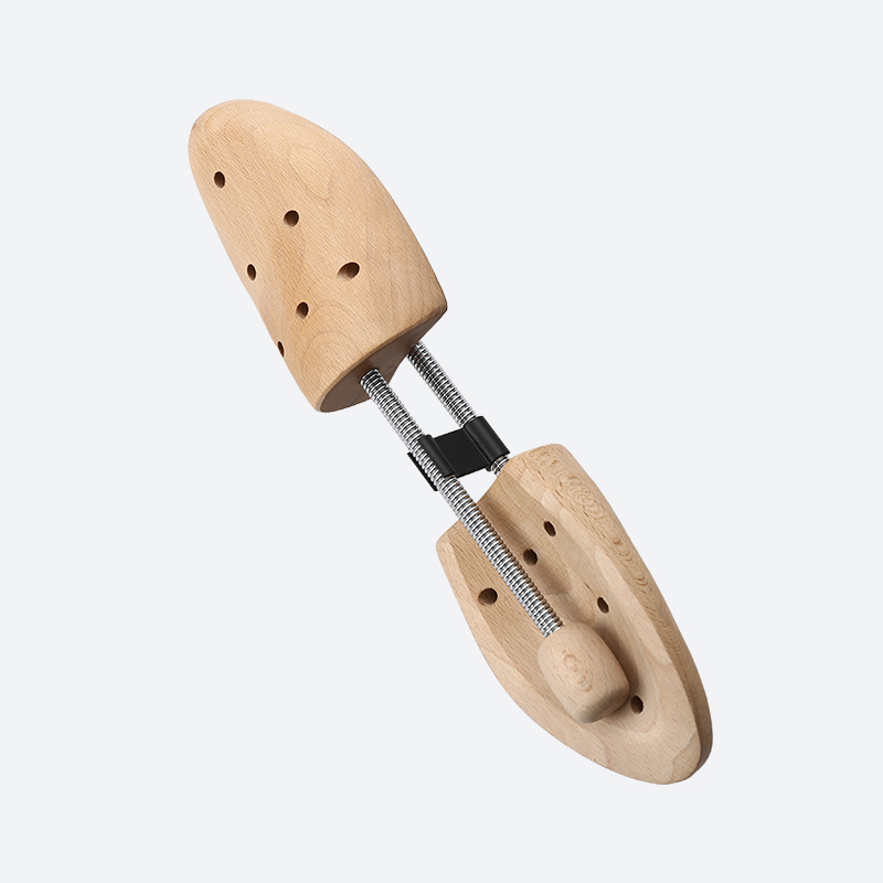 Tirascarpe in legno a sei fori con fori