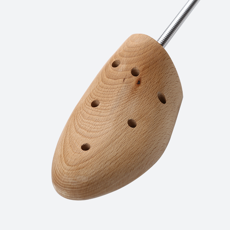 Tirascarpe in legno a sei fori con fori