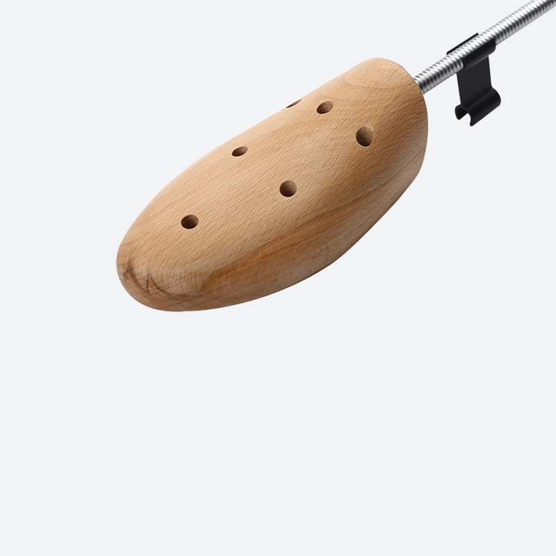 Tirascarpe in legno a sei fori con fori
